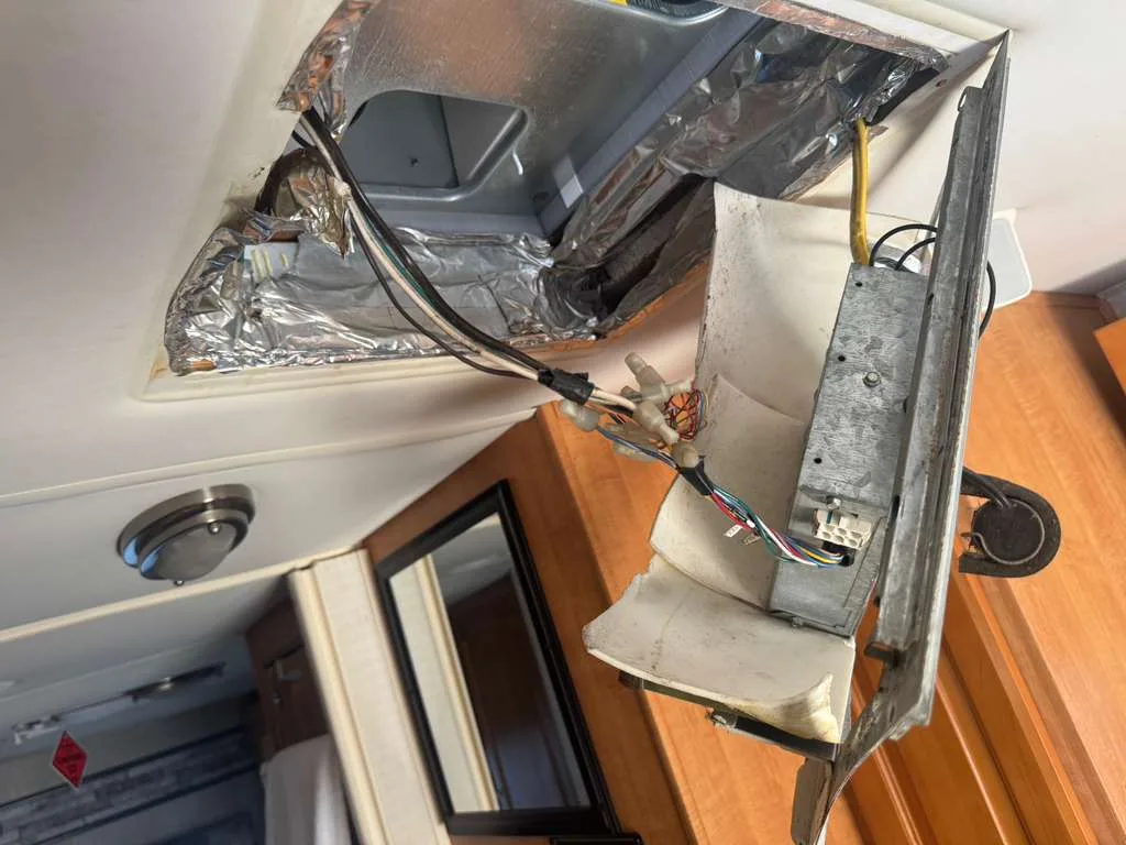 Roof vent service on an RV, part of the airflow path an absorption refrigerator depends on